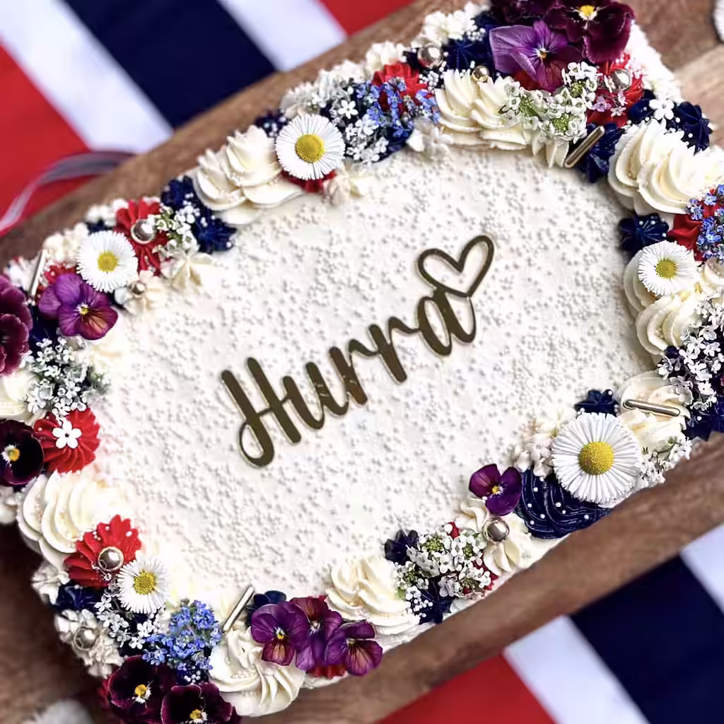 May 17th cake with edible flowers - get the recipe